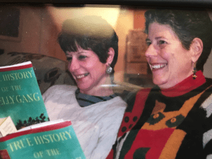The author and her sister read Peter Carey together.